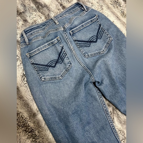 Women's Light Blue Distressed Flare Jeans - Picture 9 of 10